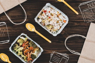 Lunch boxes on a table.